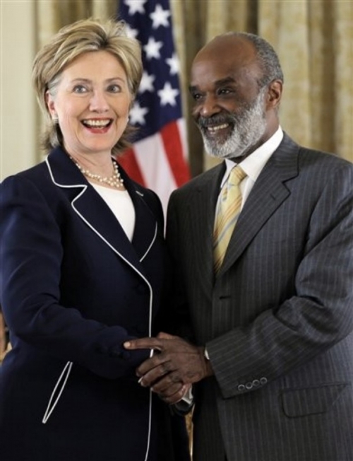 Secretary of state Hillary Clinton and President Preval